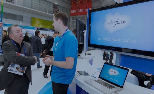Two men talking at CEBIT Australia at Salesforce.com booth.