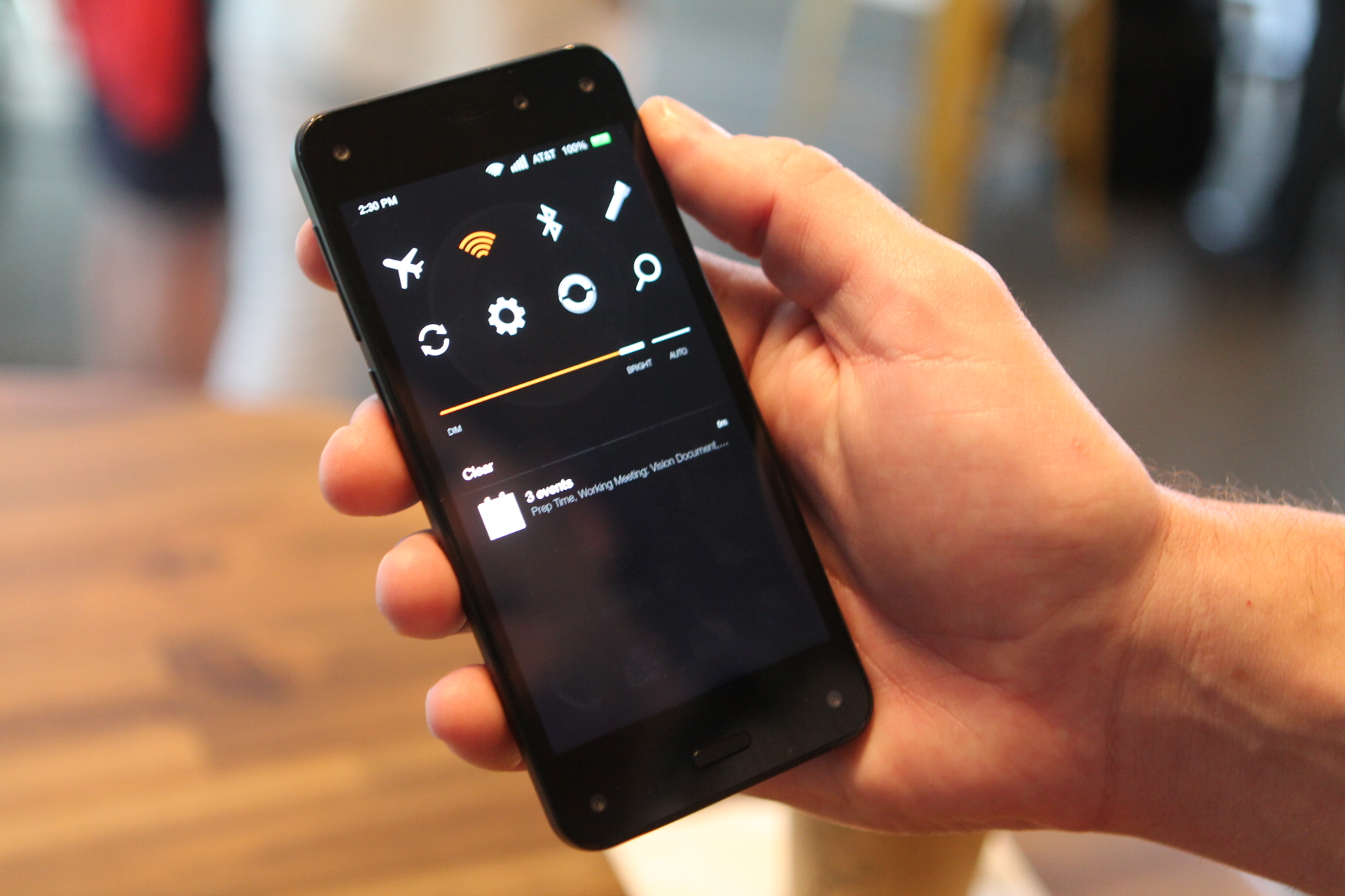 There are tilt-based gestures integrated throughout the Fire Phone's OS. A flick brings up the quick actions menu, which includes Mayday. 