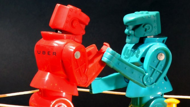 Uber Lyft fighting in a ring