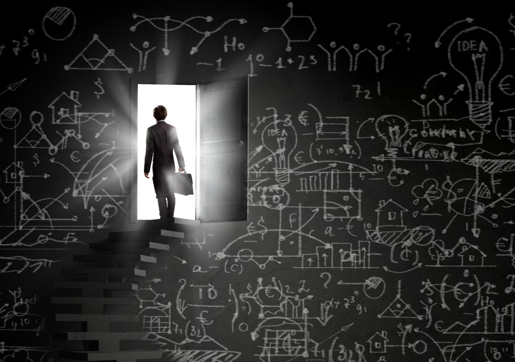 person on stairway with briefcase
