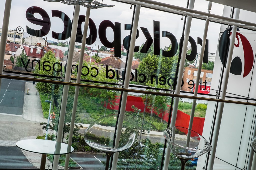 Rackspace logo, backward through a window.