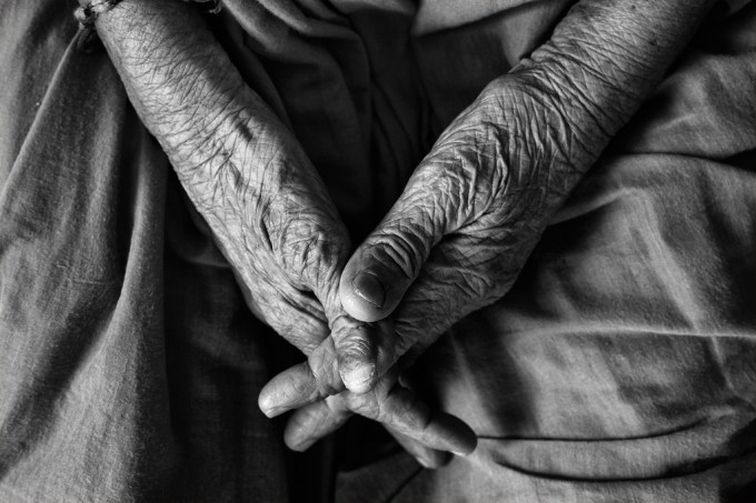 aging, elderly hands clasped
