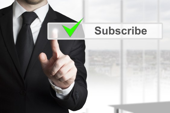 Man pushing a virtual subscribe button.