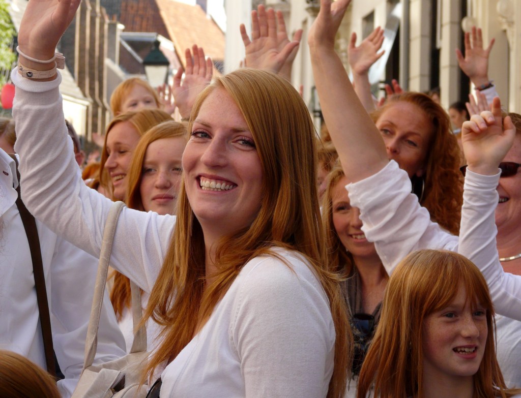 Group of people waving.