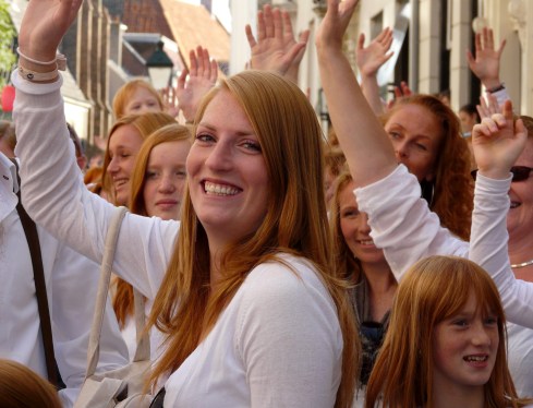 Group of people waving.