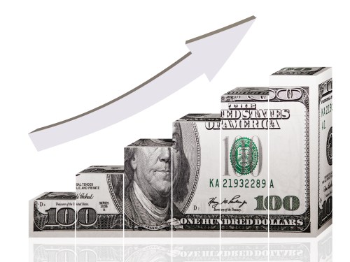 Graph made from US 100 dollar bill with arrow pointing up.