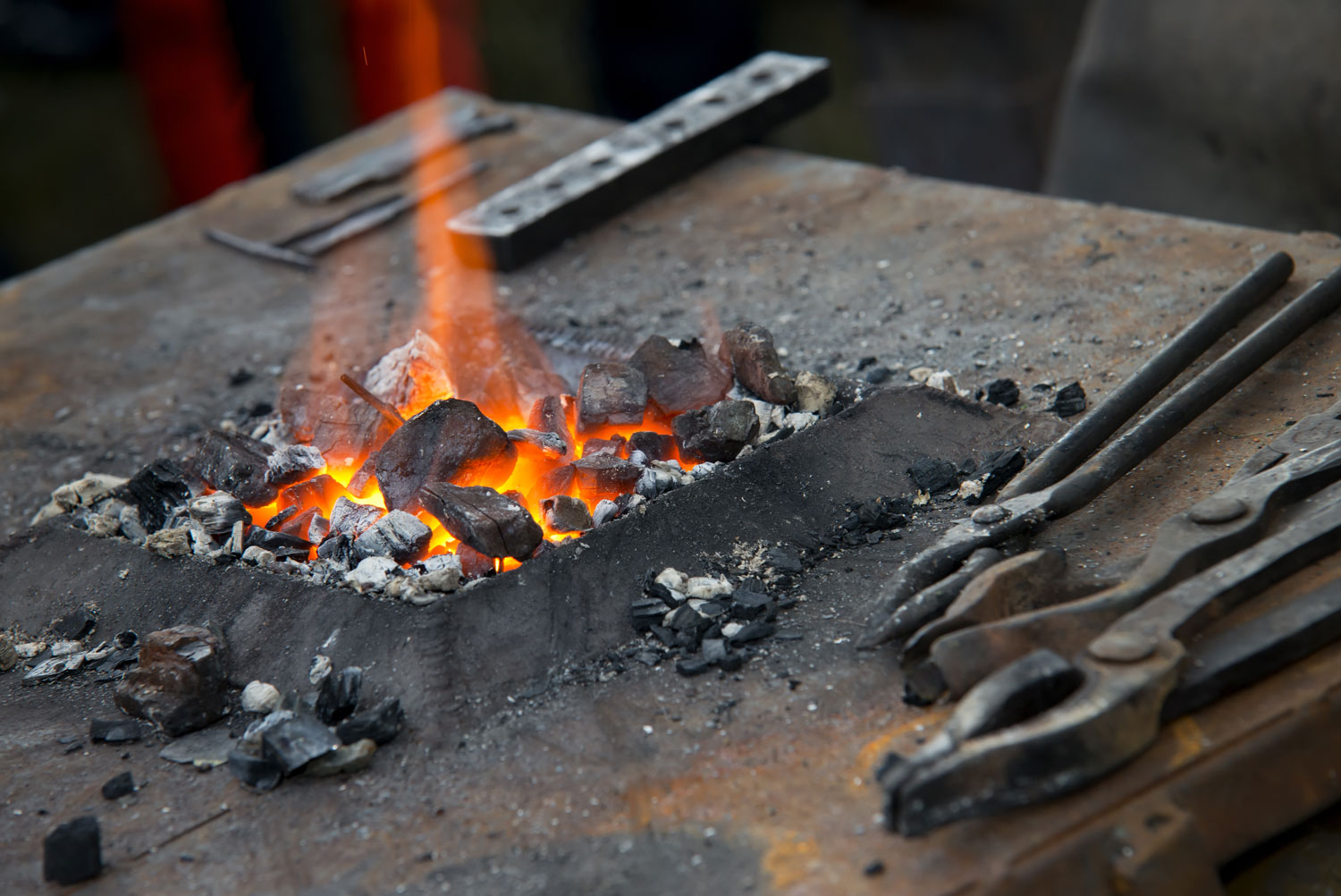 forge with tools