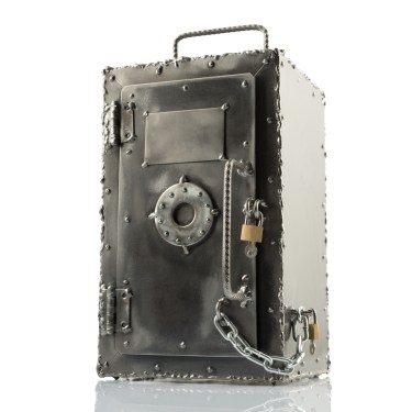 Vault protected with multiple chains and padlocks.