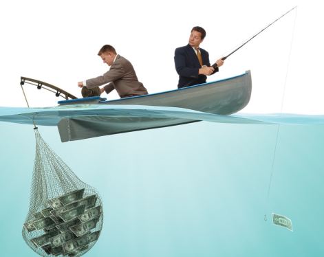 Two men fishing in a boat. One has a load of money caught in a fishing net, tipping the boat forwards it's so heavy.
