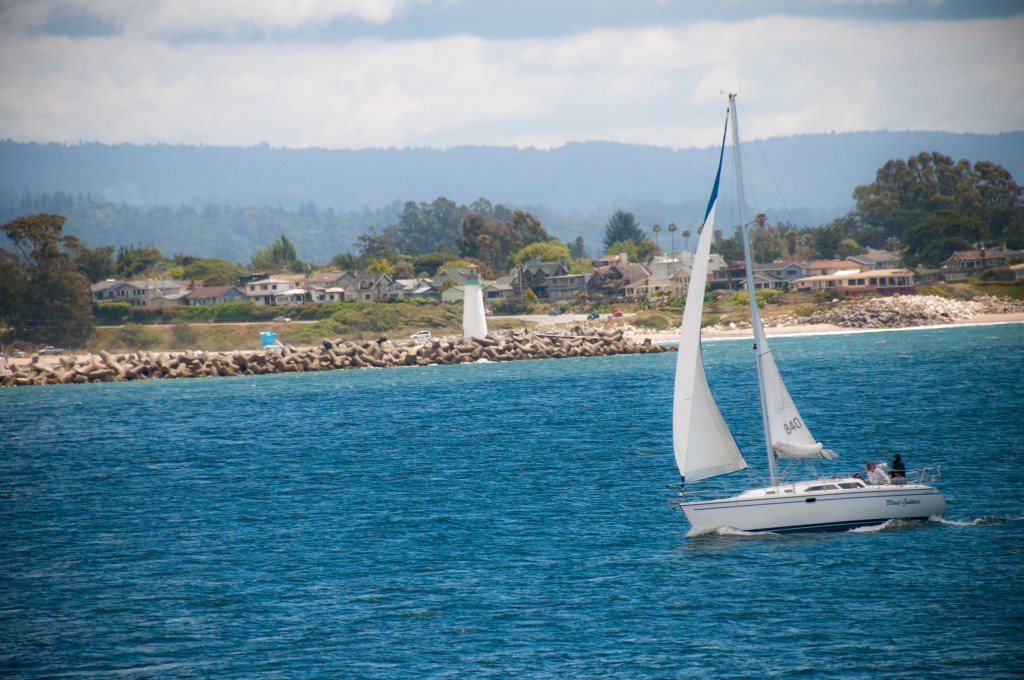 Boat sailing on smooth waters.