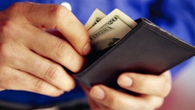 Man taking money from wallet