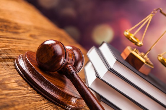 gavel, law books and scales of justice