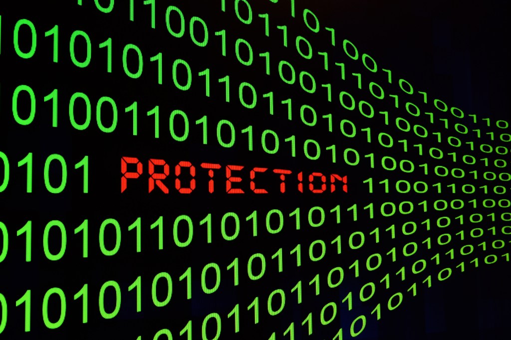 Zeros and ones in green with a red Protection in the midst of it.