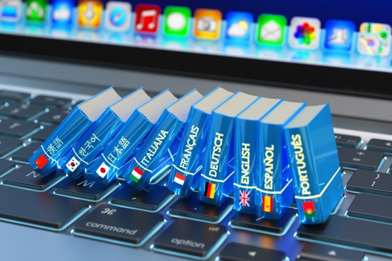 Foreign language dictionaries on a keyboard to illustrate online translation.