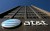 a photo of at&t's headquarters as if looking up to the sky from the entrance