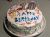 Tenth birthday cake with white frosting.