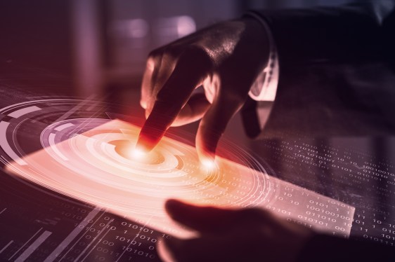Businessman pressing modern technology panel with finger print