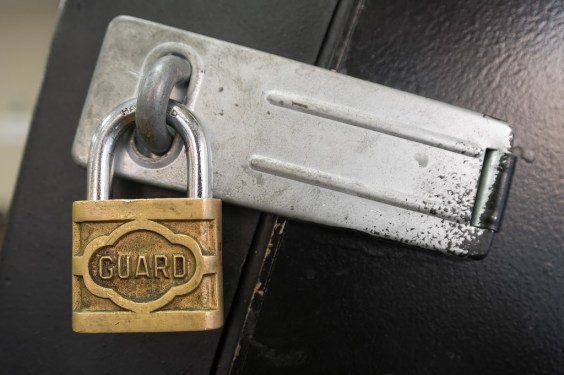 Padlock with word "guard" on it.