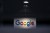 a photo of Google's logo on a dark background