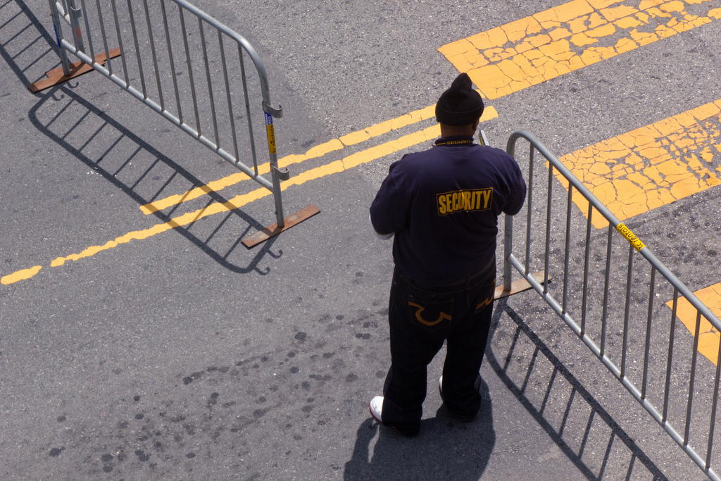 Security guard at barrier.