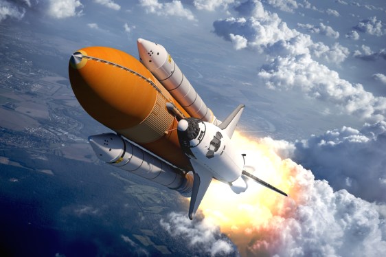 Space Shuttle with two rocket boosters attached.