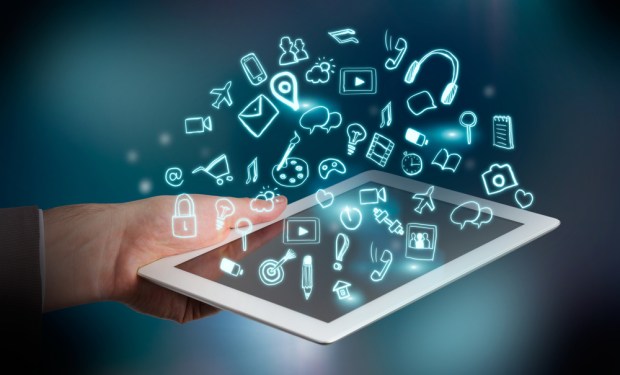 Multiple apps jumping off a tablet screen.