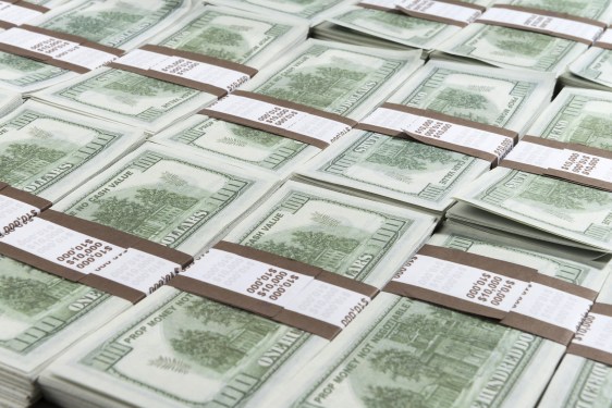 stacks of hundred dollar bills