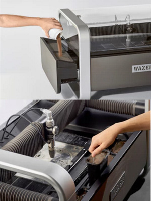 Garnet is easily added at the side of Wazer's tank. Once used, the spent cutting abrasive can be removed in tiny buckets at the front of the machine. 