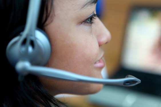 Customer service rep on phone.