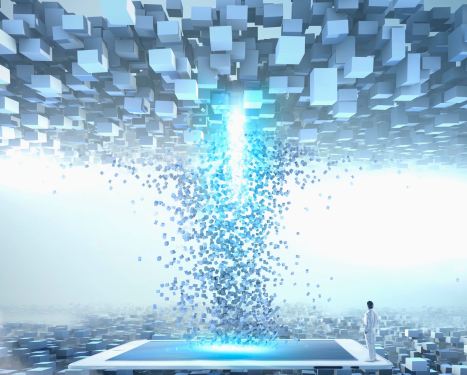 Person watching light column in cloud of blocks