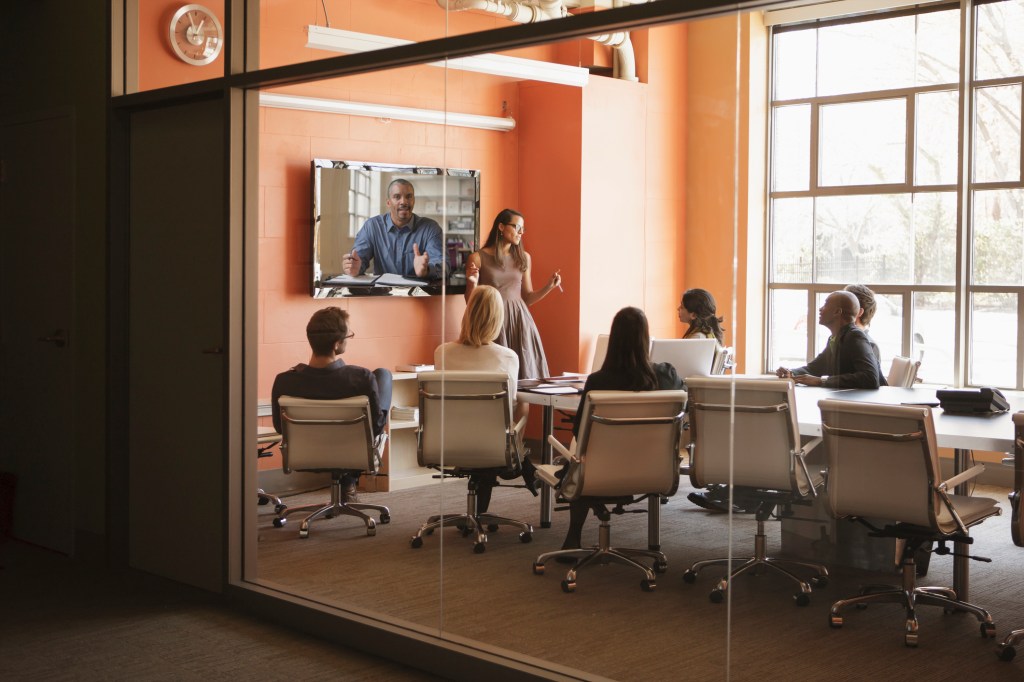 Business people having teleconference in meeting