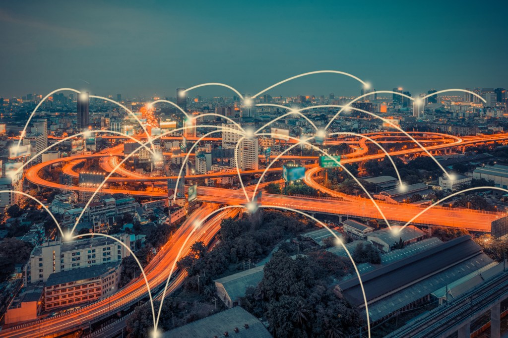 Network connections depicted over a city.