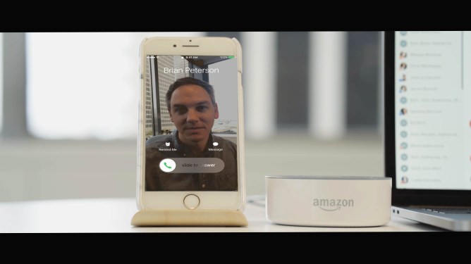 Amazon Dot next to iPhone.