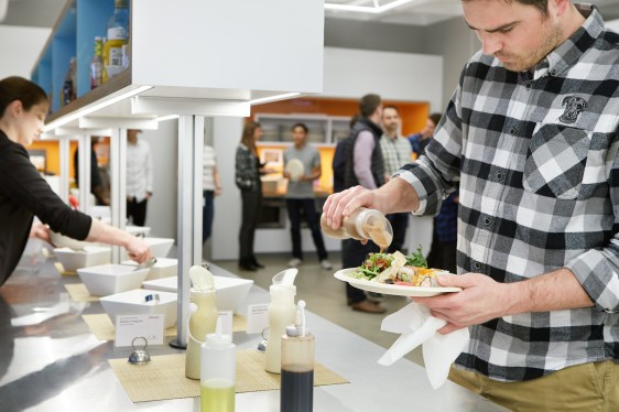 man at salad bar