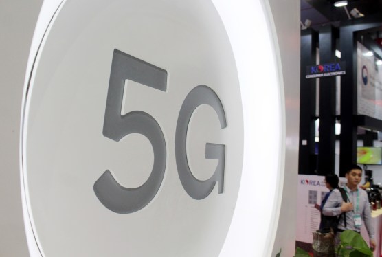 People visit the booth of 5G communication technology during the China International Import Expo (CIIE) at the National Exhibition and Convention Center on November 7, 2018 in Shanghai, China. The first China International Import Expo is held on November 5-10 in Shanghai.