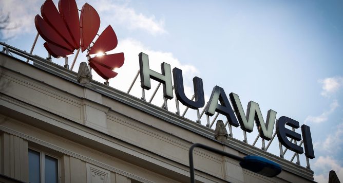 The Huawei logo is seen in the center of Warsaw, Poland