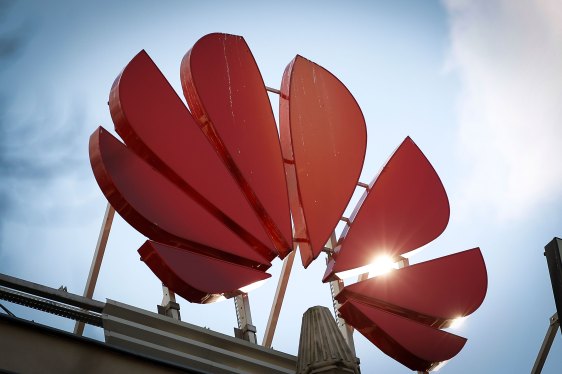 The Huawei logo is seen in the center of Warsaw, Poland