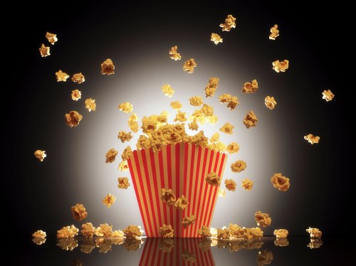 Popcorn exploding from bucket.