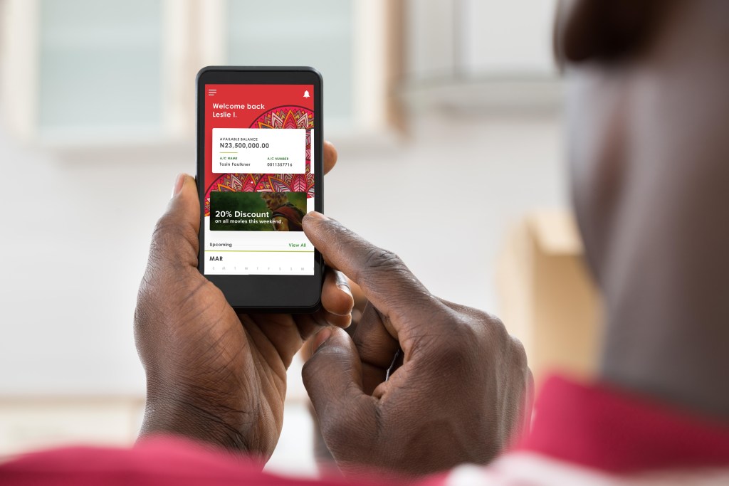 Person using the Moniepoint app on a mobile phone