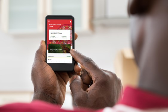 Person using the Moniepoint app on a mobile phone