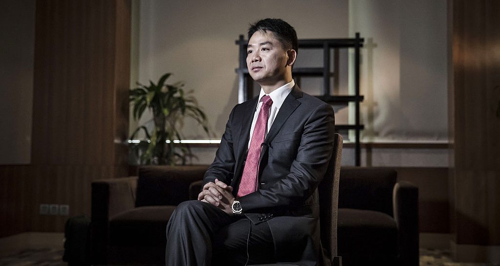 JD.com CEO Richard Liu. seated