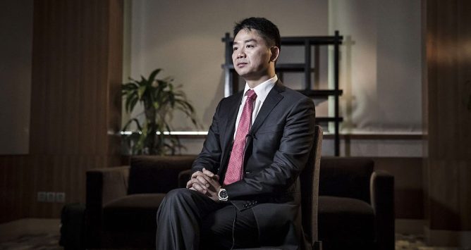 JD.com CEO Richard Liu. seated