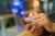 Hand holding mobile phone