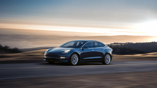 Tesla Model 3 driving