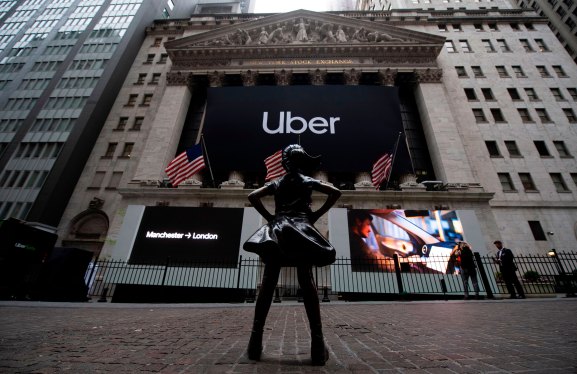The "Fearless Girl" statue, by sculptor Kristen Visbal, stands outside the New York Stock Exchange (NYSE) ahead of Uber's IPO