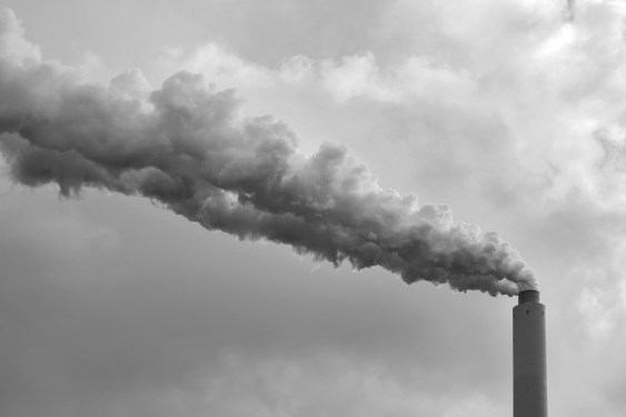 Low Angle View Of Smoke Stack Against Sky