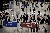 A GIF of a facial recognition system matching faces in a busy airport.