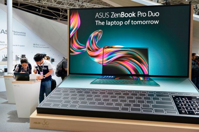 People visit the ASUS stand during Computex at Nangang exhibition centre in Taipei on May 28, 2019. (Photo by Chris STOWERS / AFP) (Photo credit should read CHRIS STOWERS/AFP/Getty Images)