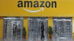 An Indian security guard walks inside Amazon's largest Fulfillment Centre (FC) in India, on the outskirts of Hyderabad on September 7, 2017. / AFP PHOTO / (Photo credit should read NOAH SEELAM/AFP/Getty Images)