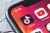 TikTok and YouTube apps on screen iphone xr, close up